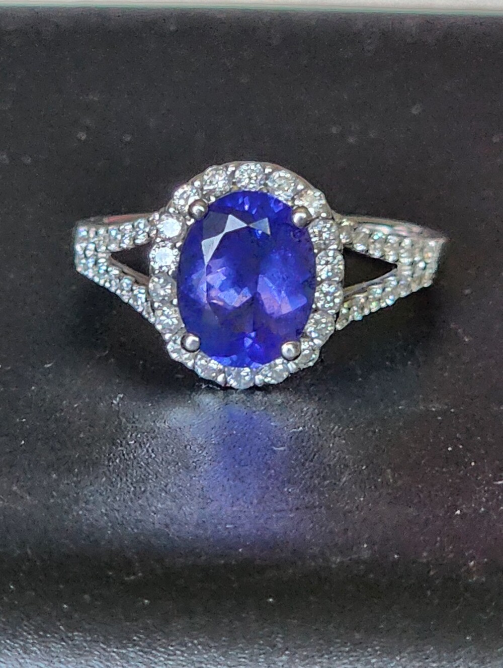 Extraordinary Purple Tanzanite Halo Ring with Pavé Band In White Gold